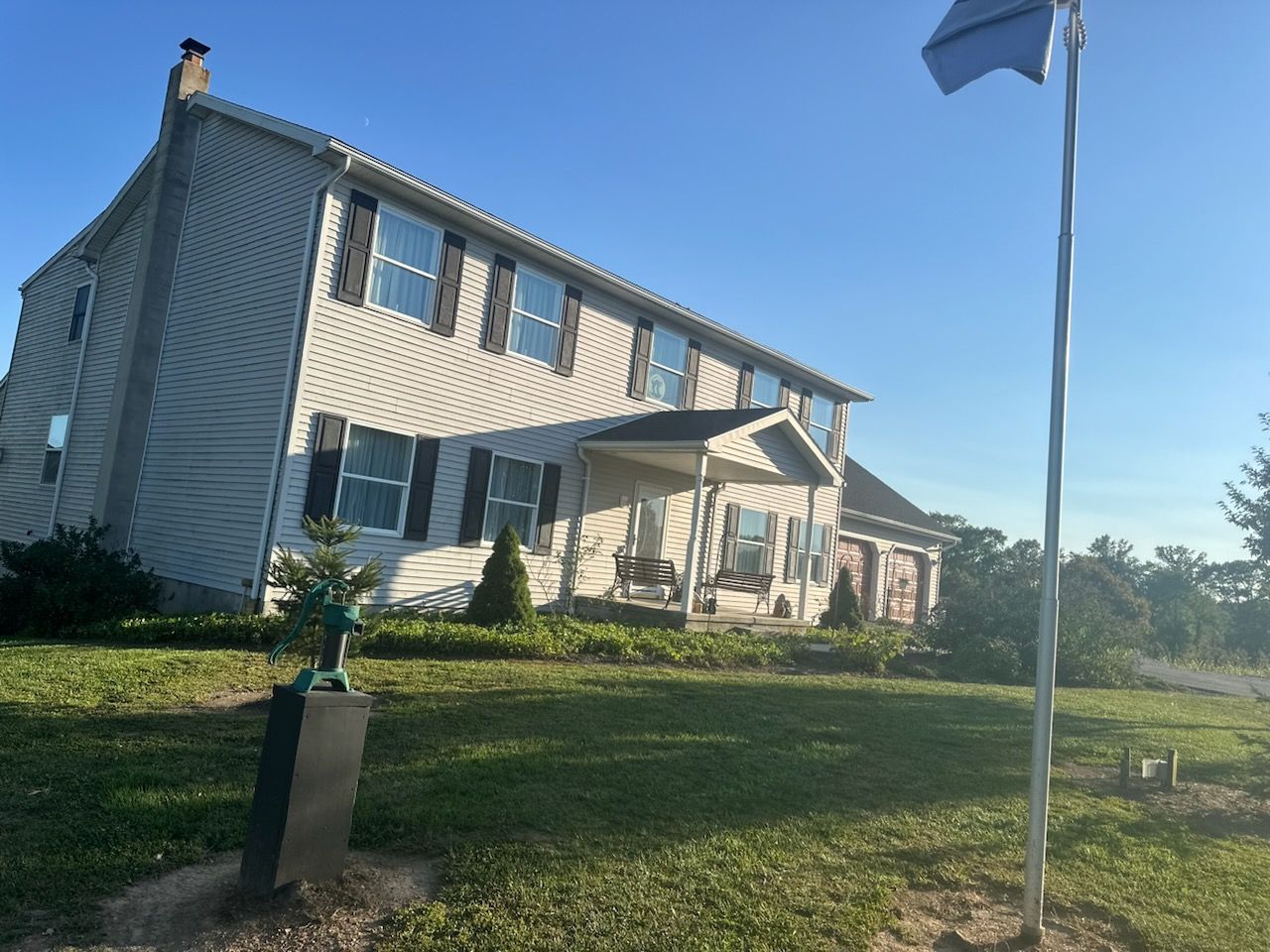 A house with a flag in front of it