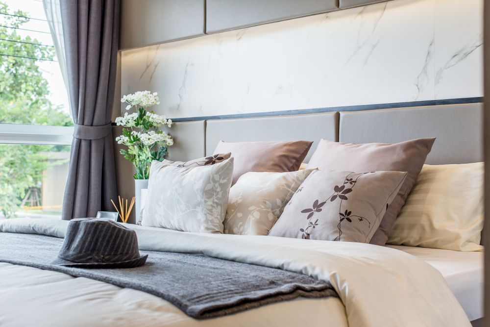 Modern Bedroom With a Neatly Made Bed — Original North Australian in Bowen, QLD
