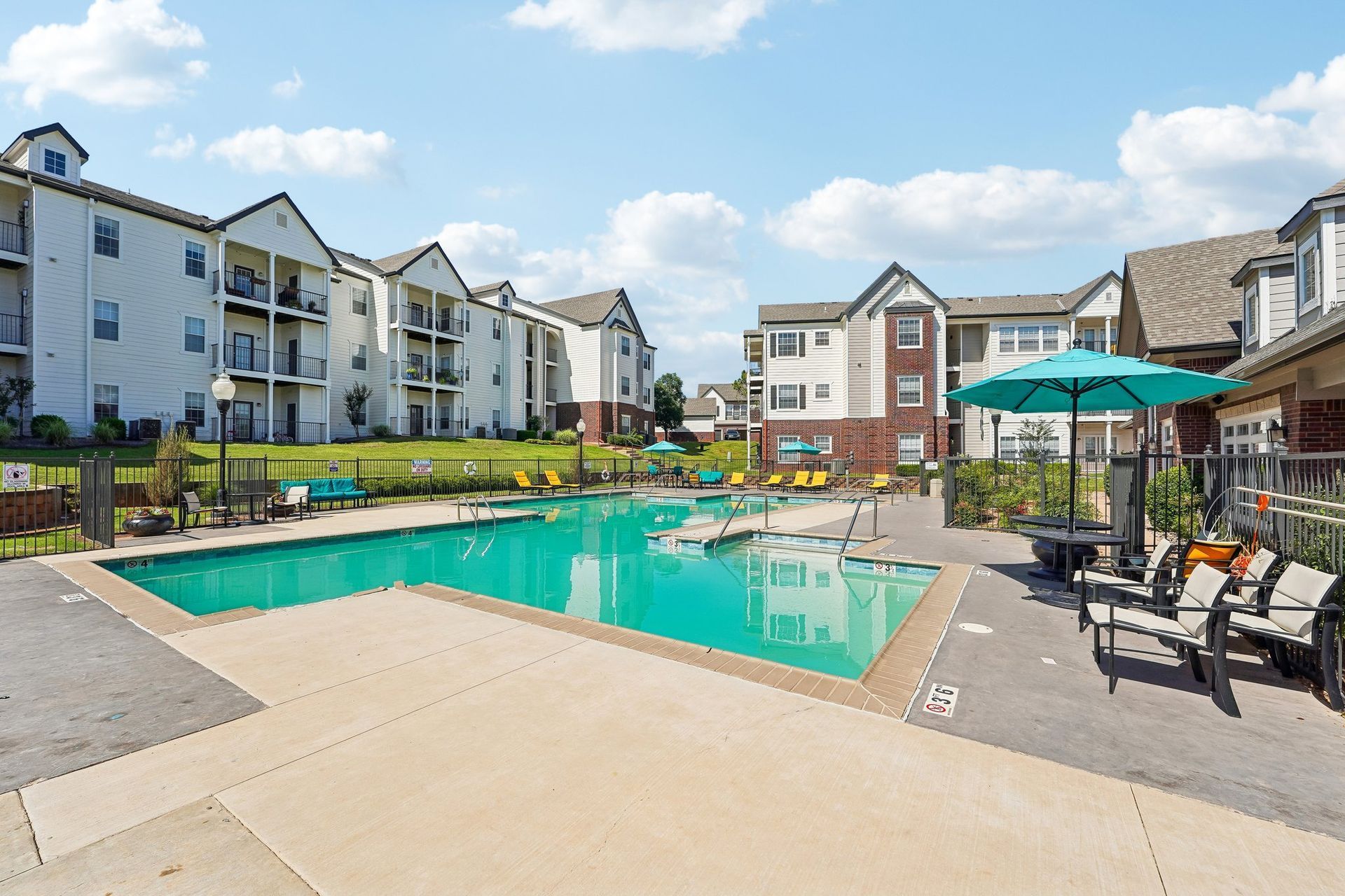 large pool with lounge chairs