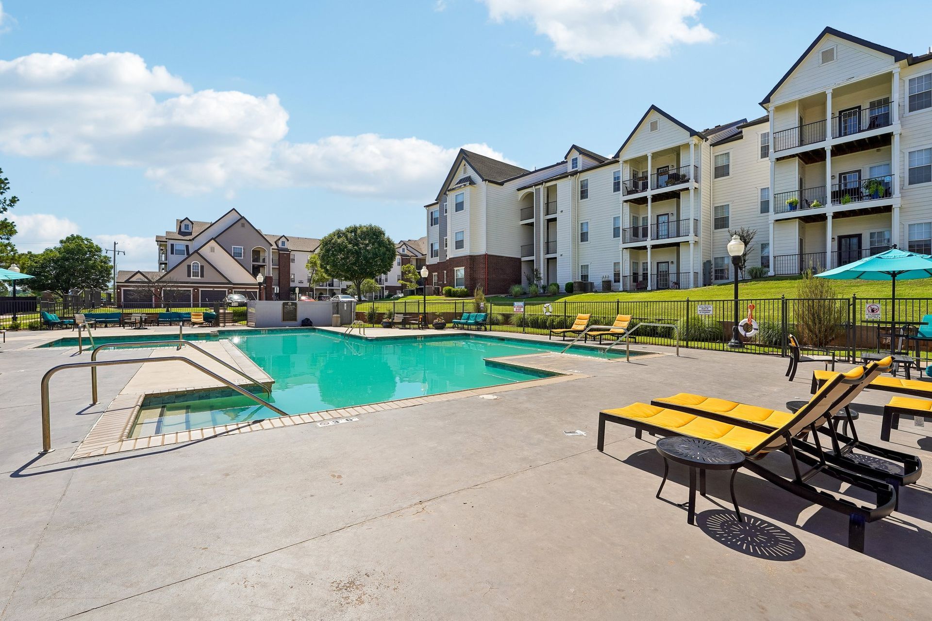 large pool with lounge chairs