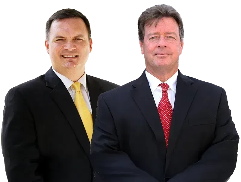 Benjamin Dunn & J. Charles Ormond, Jr. one with a yellow tie, the other with a red tie, smiling.