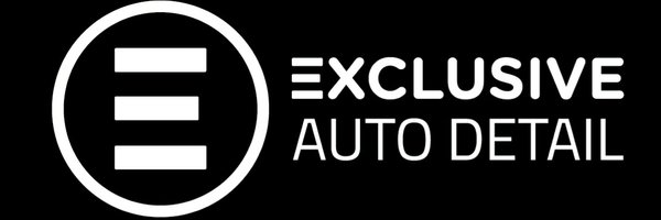 Logo for Exclusive Auto Detail; white text on a white background. 
