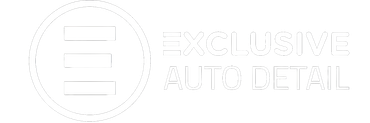 Logo for Exclusive Auto Detail. White text and design elements on a transparent background.
