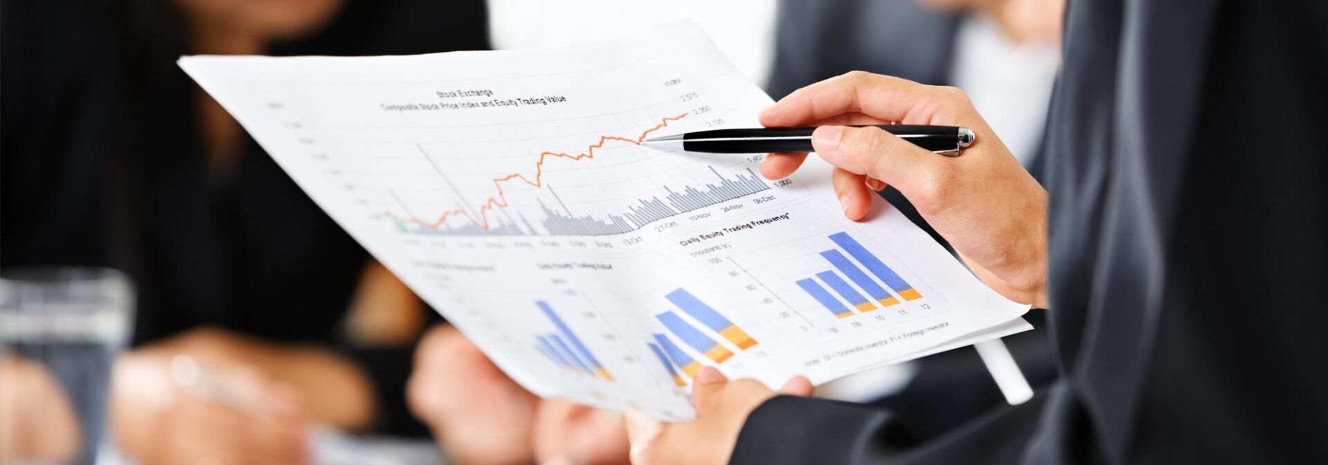 Business man working and analyzing stock exchange