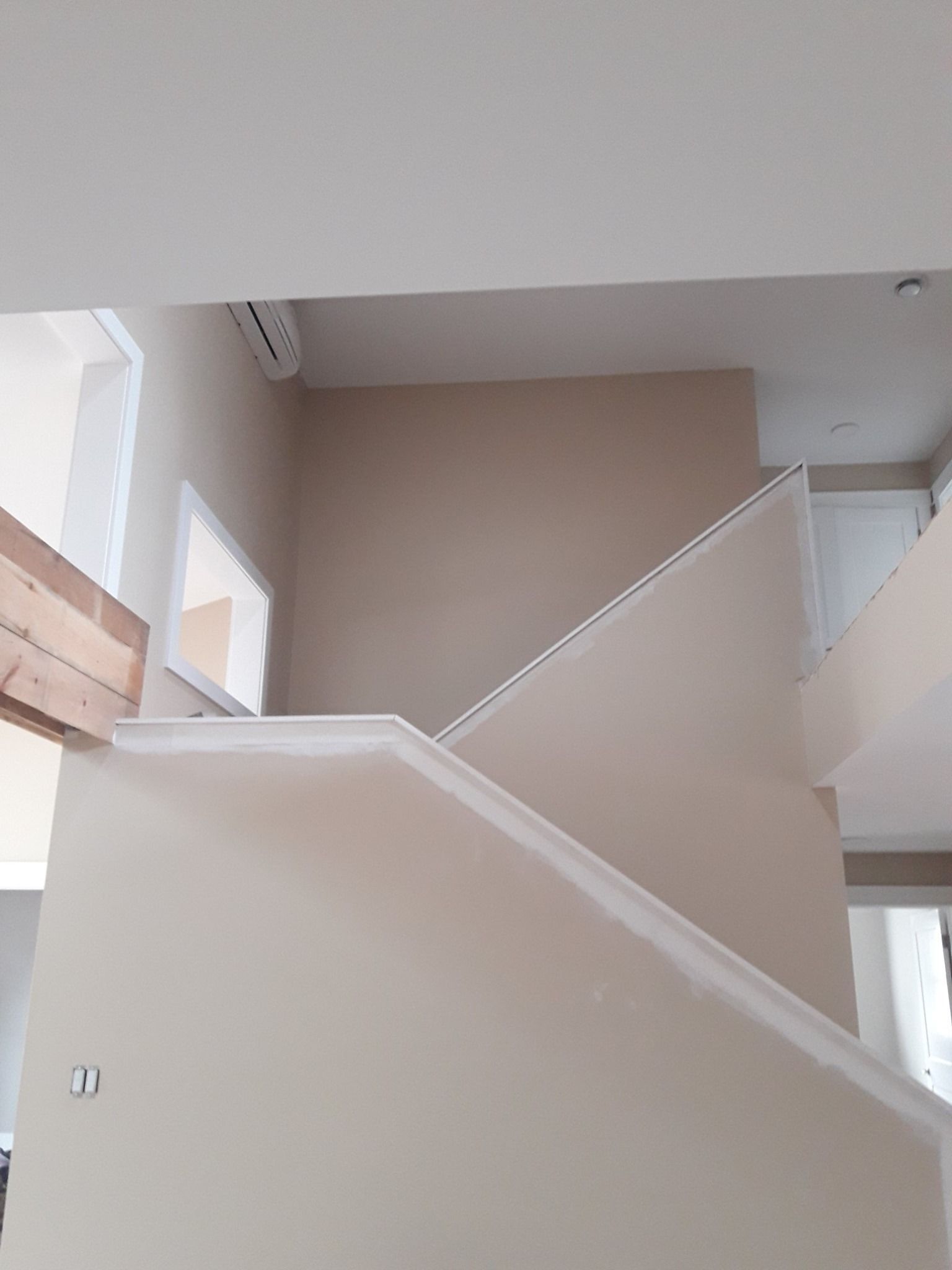 A picture of a staircase in a house.