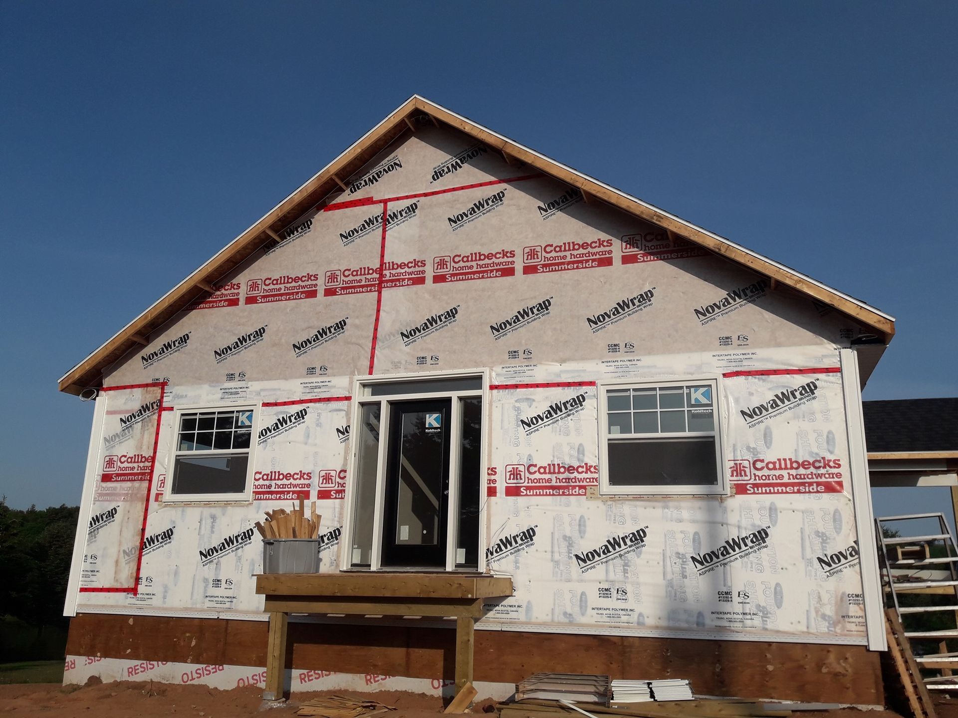 A house that is being built with a lot of insulation on it