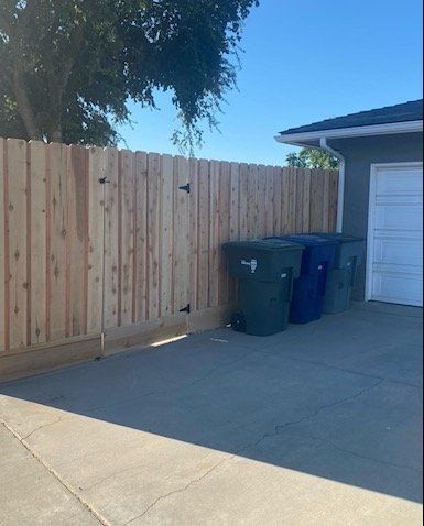 Wooden Fence With Trash Bin - Clovis, CA - Mac Fencing