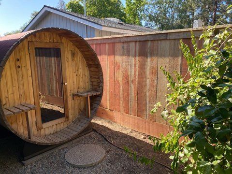 Wooden Fence Right View With Leaves - Clovis, CA - Mac Fencing
