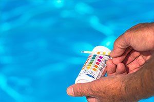 Check the pH of a private swimming pool - Pool Maintenance in Ocean County, NJ