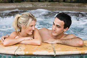 Couple relaxing in spa together - Spa Repair in Ocean County, NJ