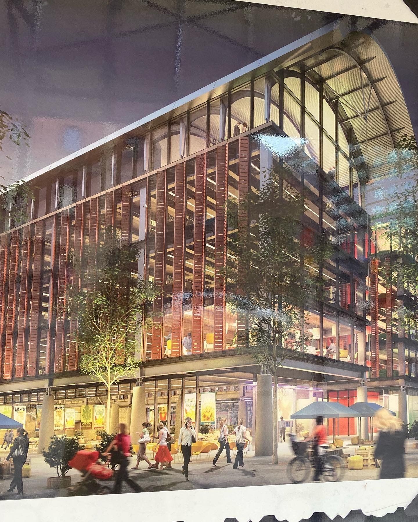 An artist 's impression of a large building with lots of windows