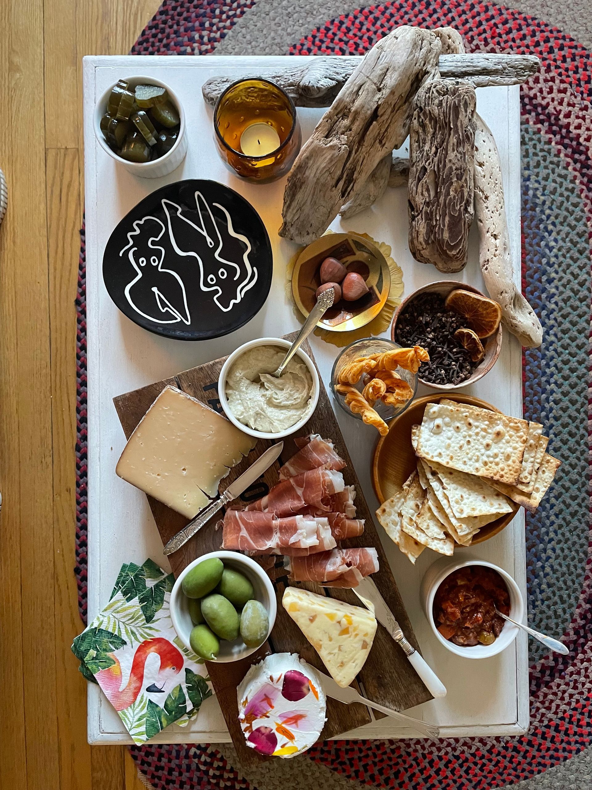 A table topped with a variety of food and drinks.