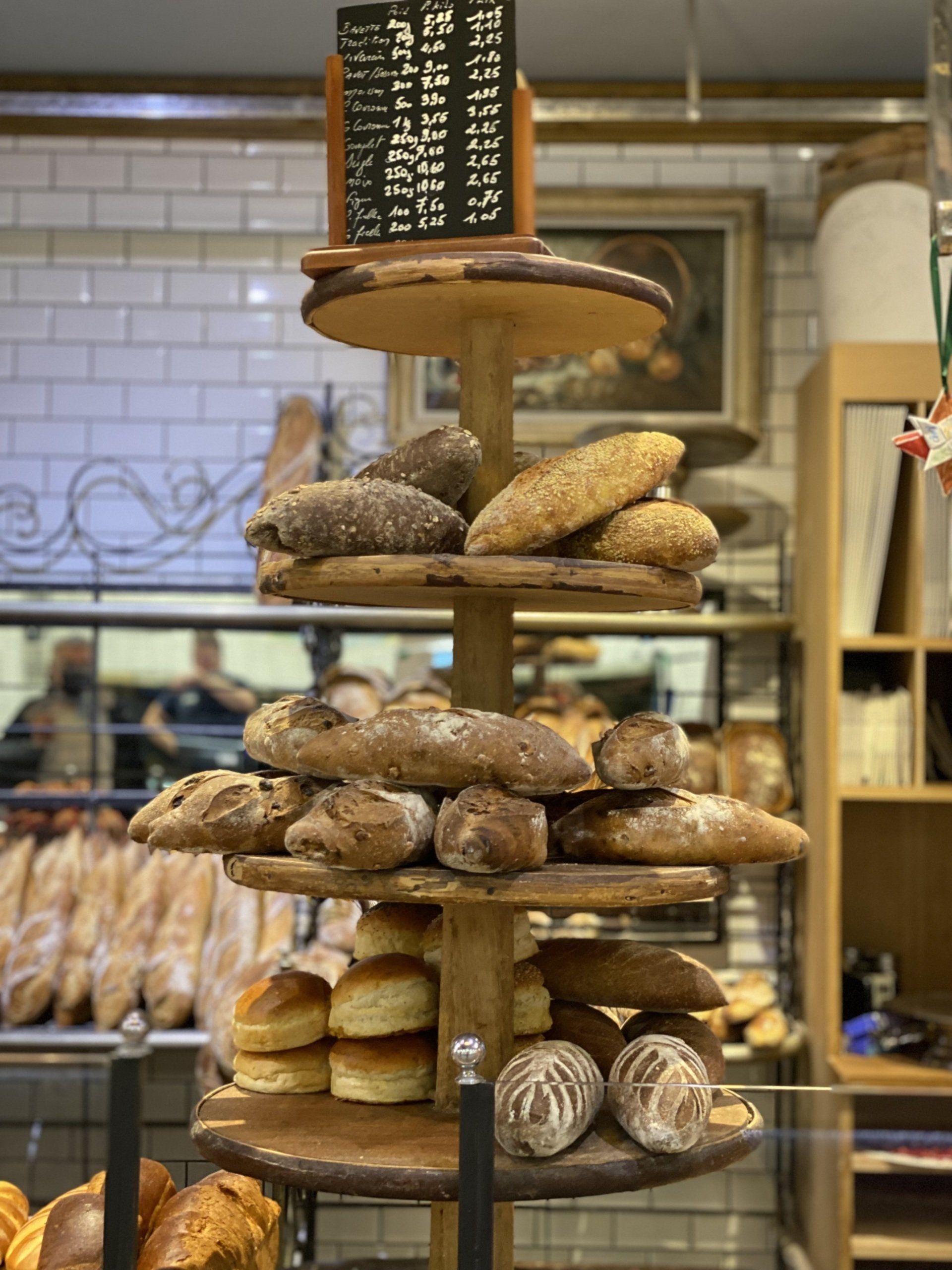 A bakery with a lot of bread on display