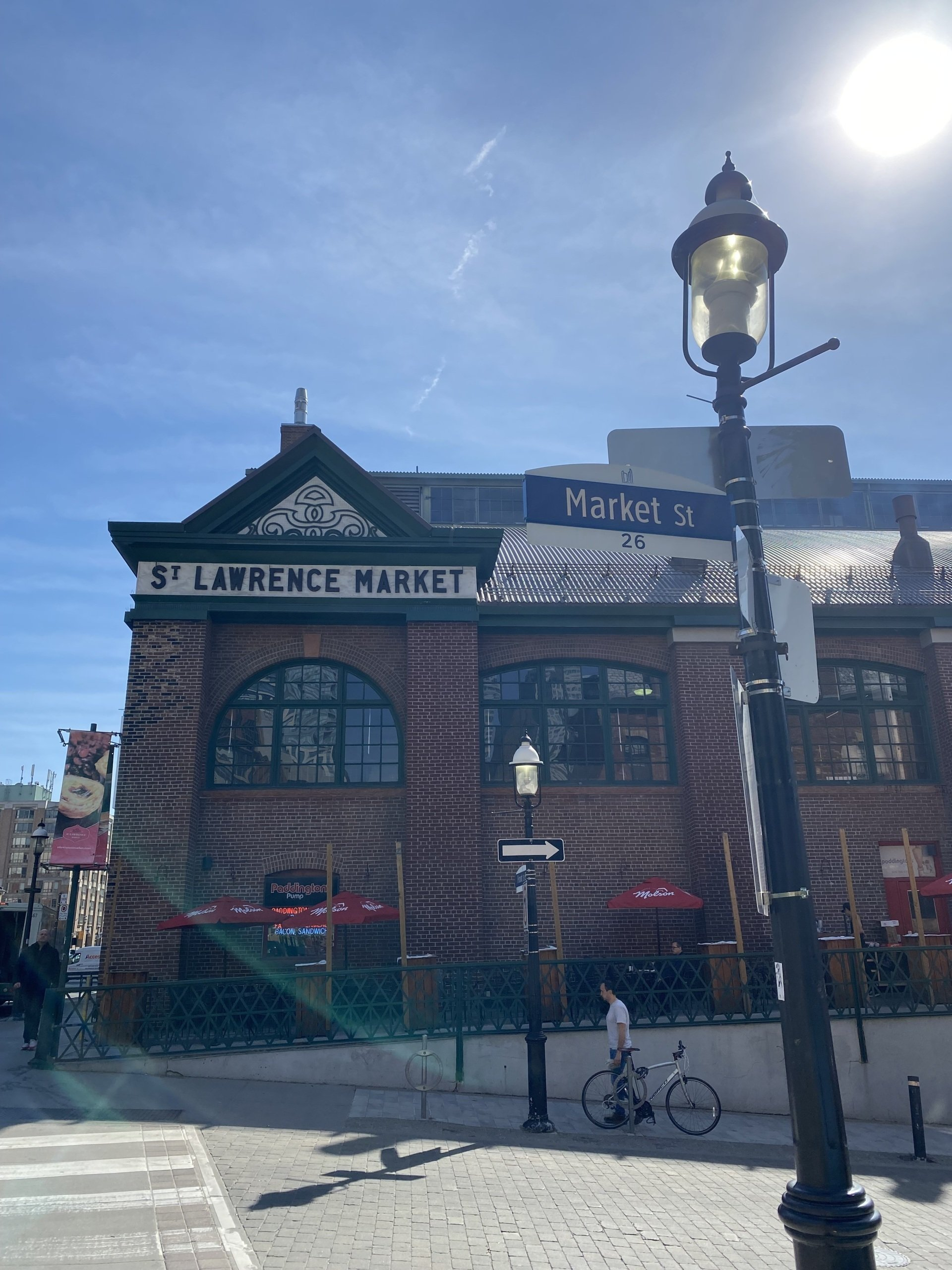 A brick building with a sign that says st lawrence market