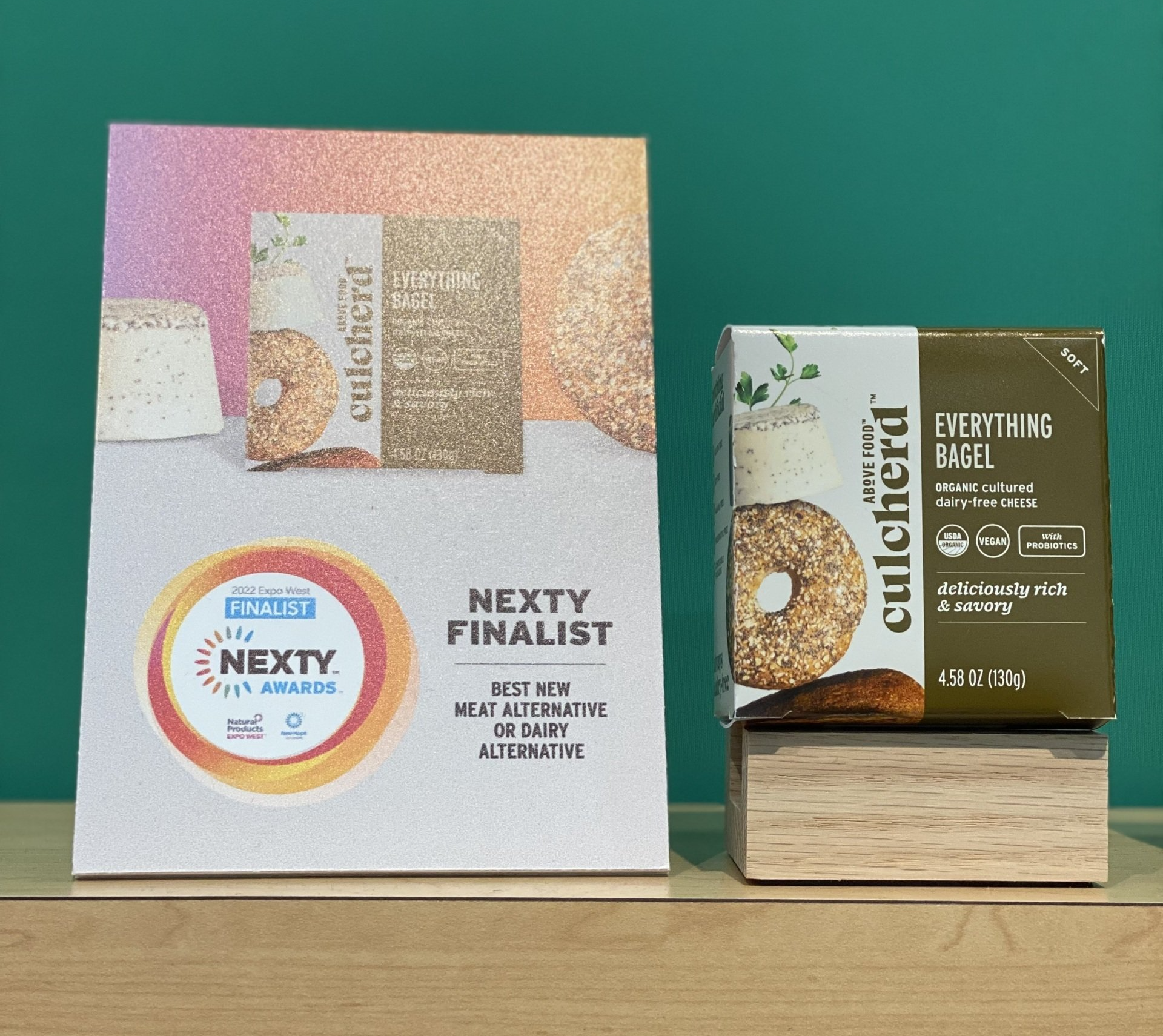 A box of everything bagel next to a sign that says nexty finalist