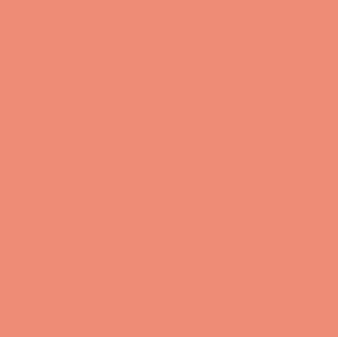A close up of a plain pink background.