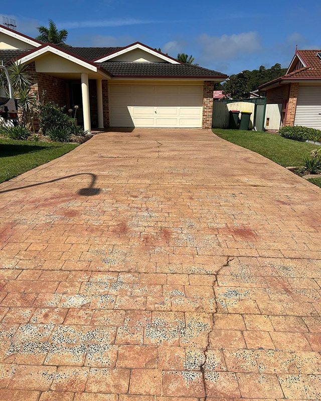 A Brick Driveway Cleaned Leading To A House — Jervis Bay Pressure Washing & Property Maintenance in Sanctuary Point, NSW