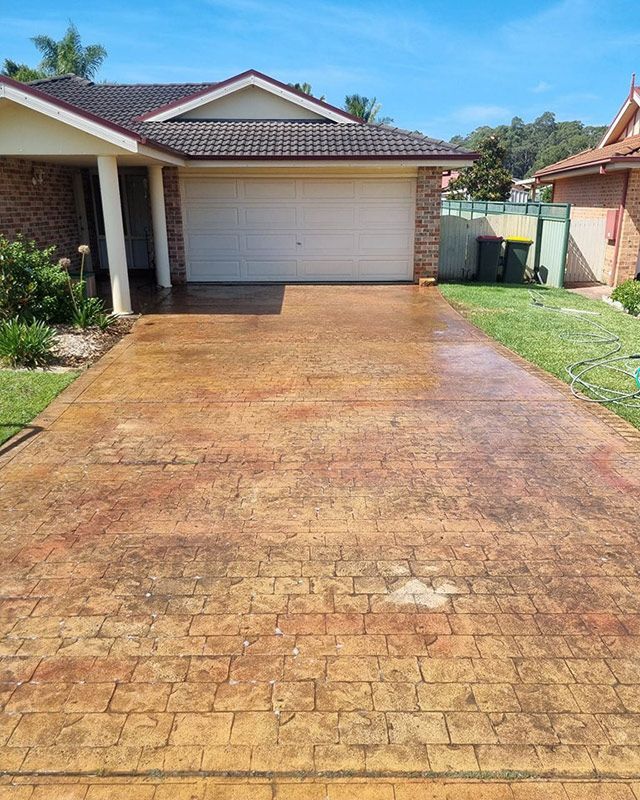 A Dirty Brick Driveway — Jervis Bay Pressure Washing & Property Maintenance in Sanctuary Point, NSW
