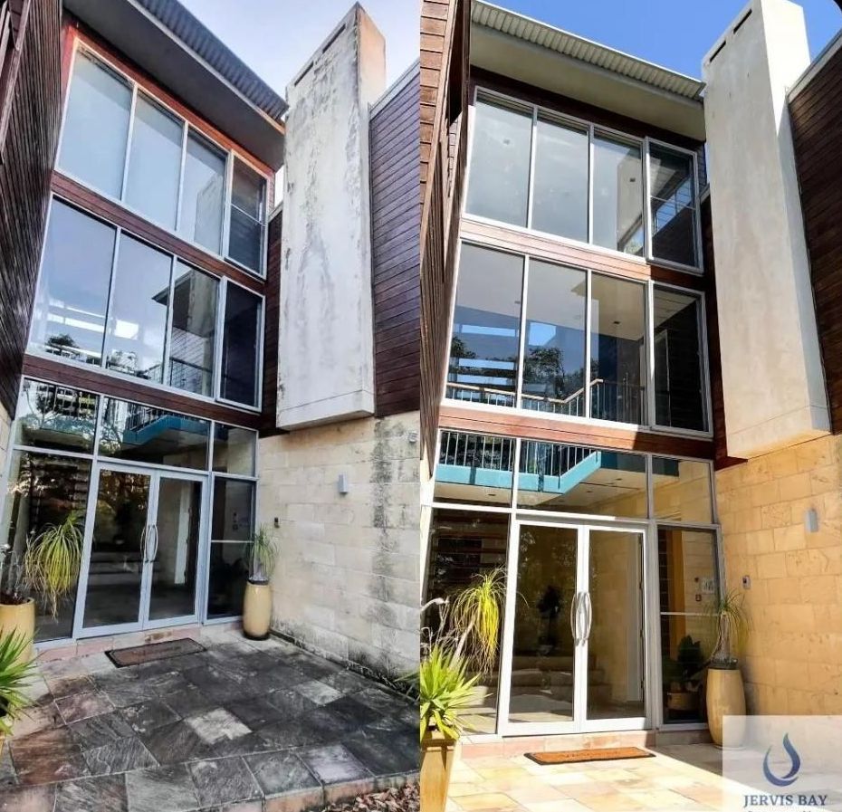 A Large Building With A Lot Of Windows — Jervis Bay Pressure Washing & Property Maintenance In Nowra, NSW
