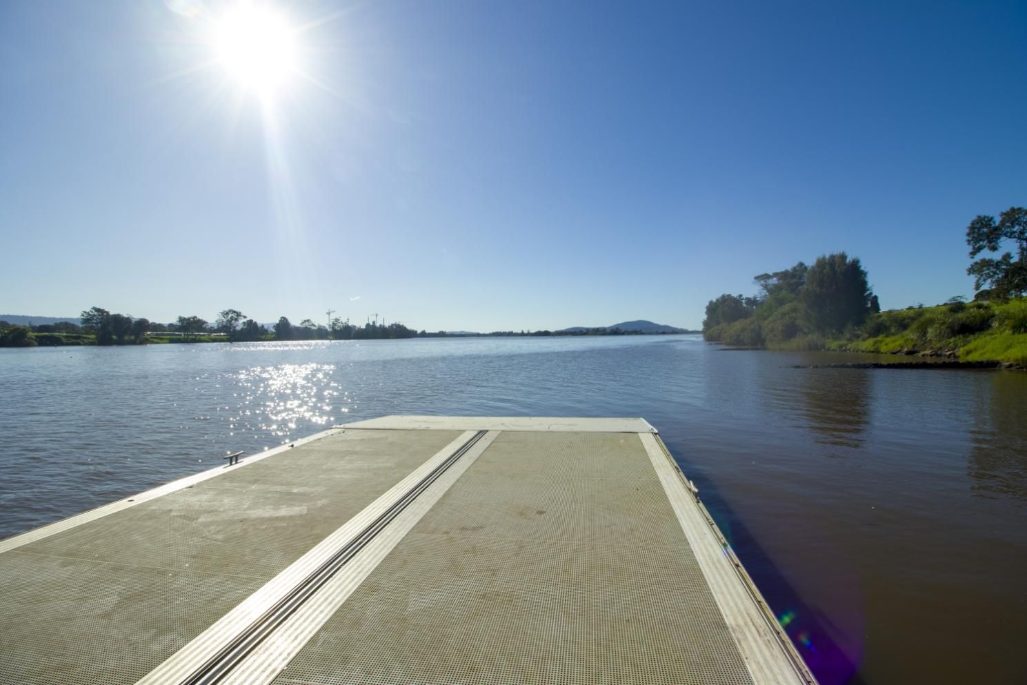 A Dock Overlooking A Large Body Of Water — Jervis Bay Pressure Washing & Property Maintenance In Bomaderry, NSW