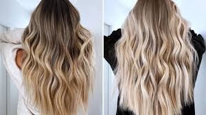 Two images side by side. Long wavy hair; left is ombre brown to blonde, right is blonde.