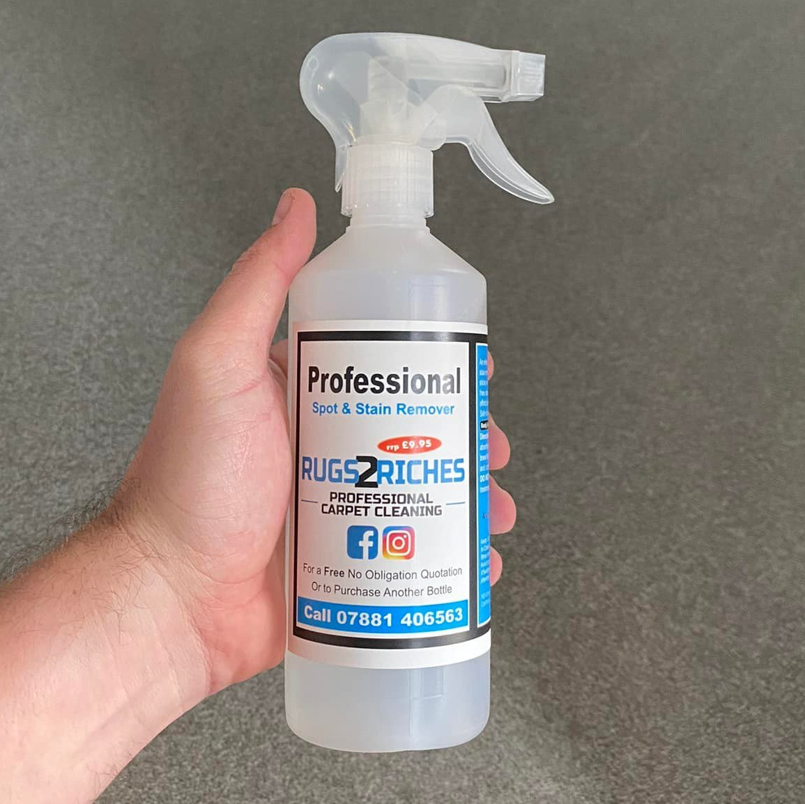 a person is holding a bottle of professional rug cleaner