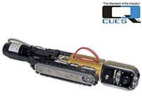 CUES pipe inspection robot with treads, camera, and lights; gold and silver.