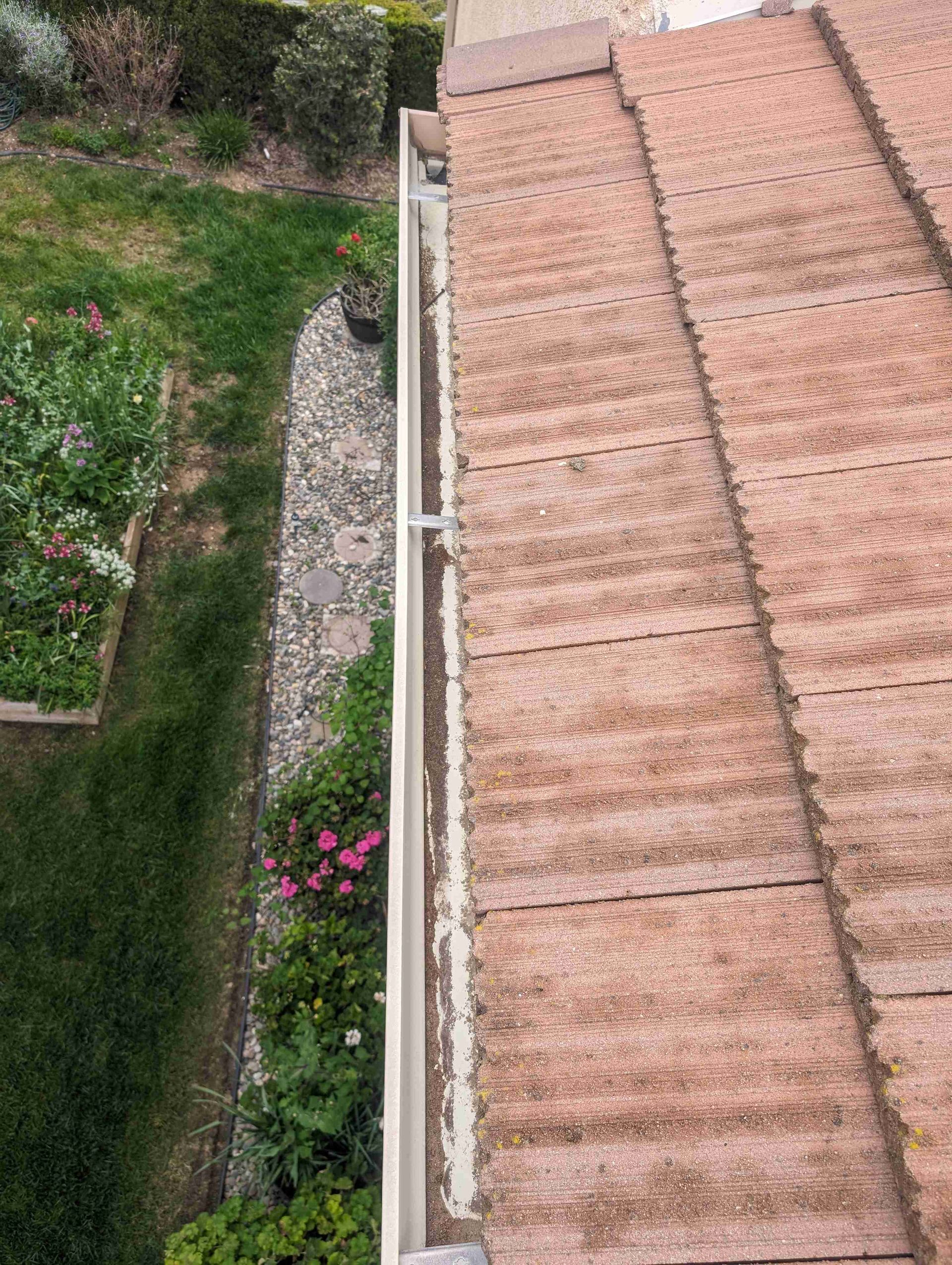 Aerial view of a gutter on the roof of a house.