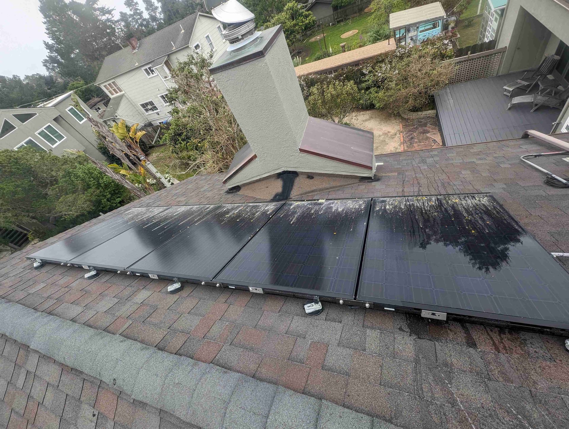 Bunch of solar panels are sitting on top of a roof.