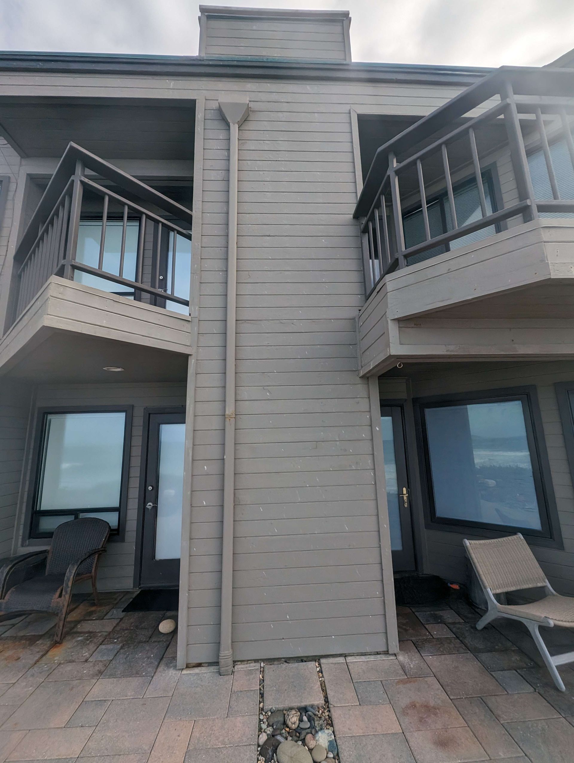 A large house with a lot of windows and balconies