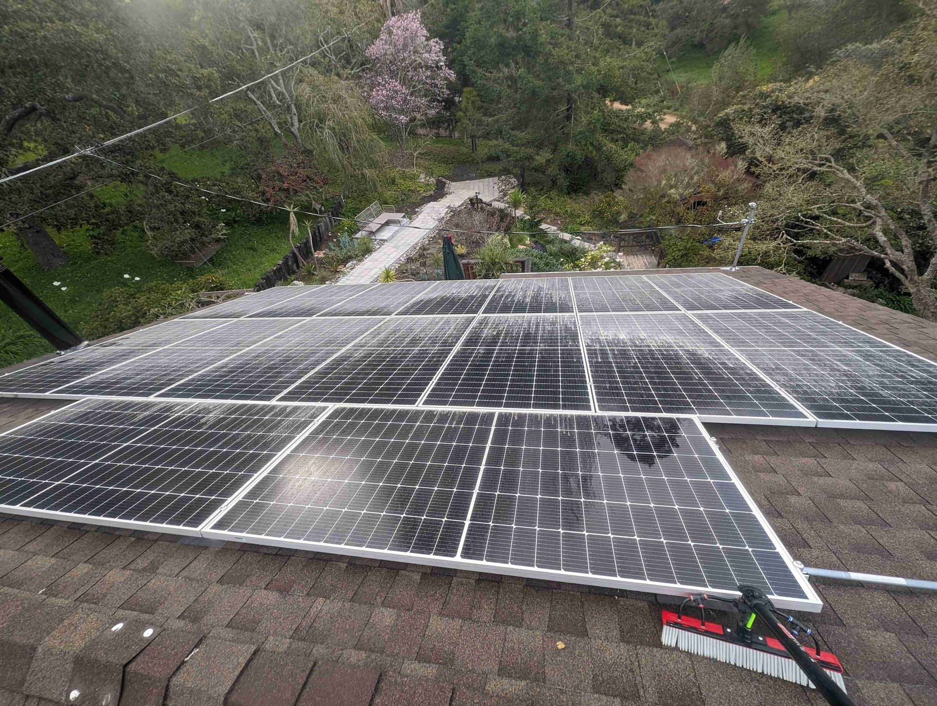 Bunch of solar panels are sitting on top of a roof.