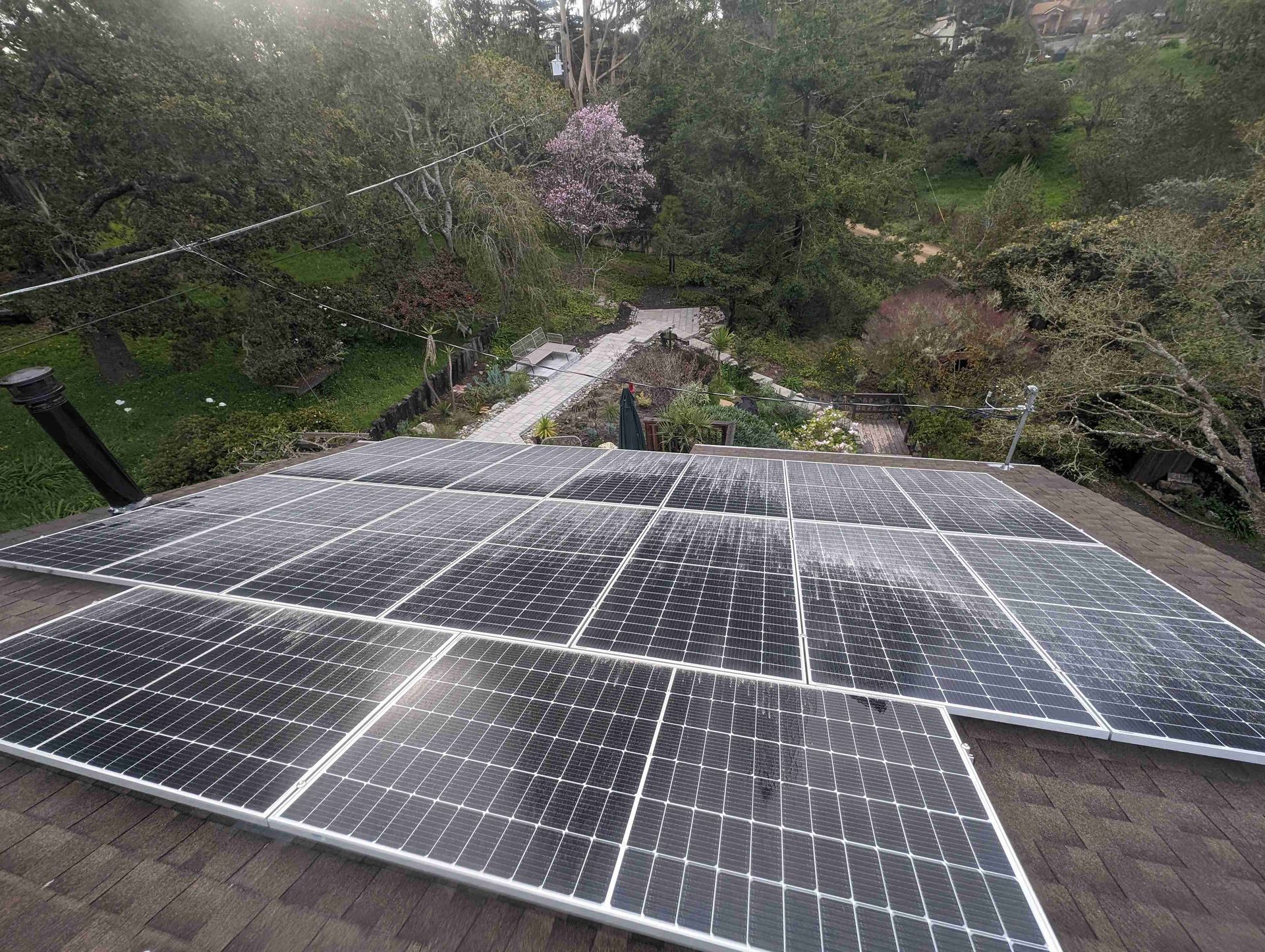 Bunch of solar panels are sitting on top of a roof.