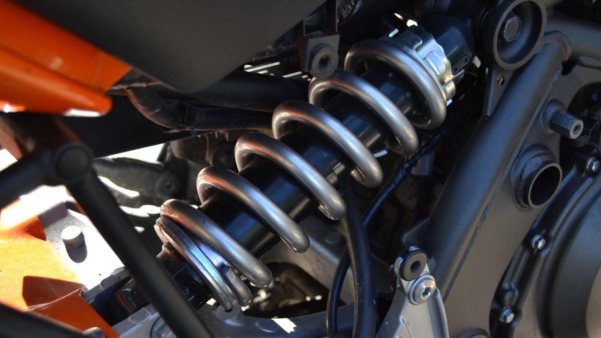 A close up of a shock absorber on a motorcycle