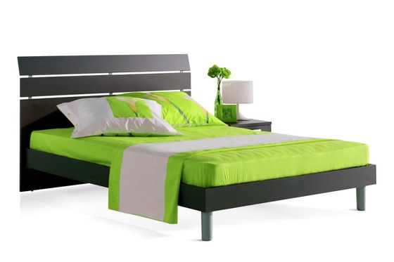 bed with green sheets