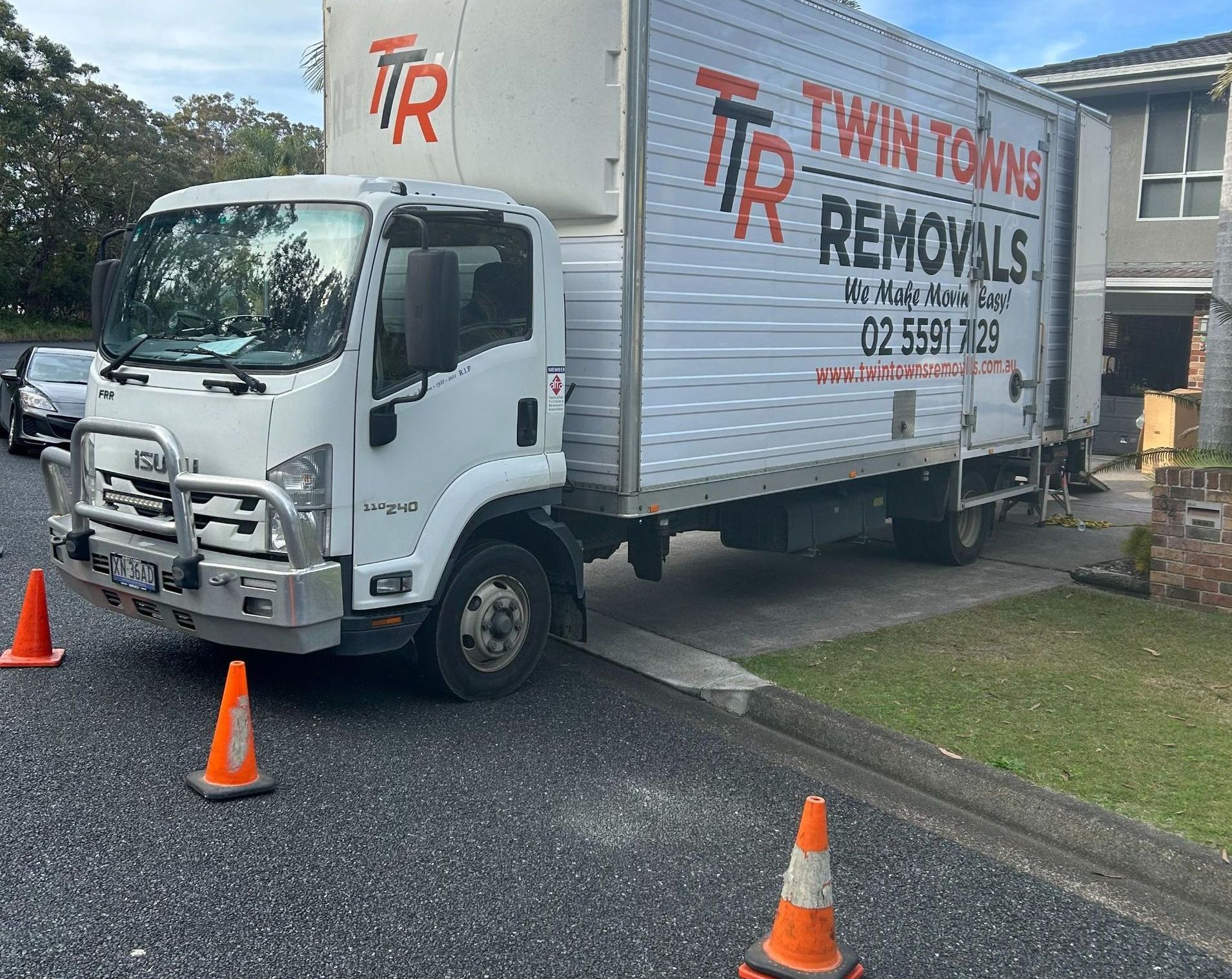 White truck is parked on the side of the road — Twin Towns Removals Mid North Coast In Tuncurry, NSW