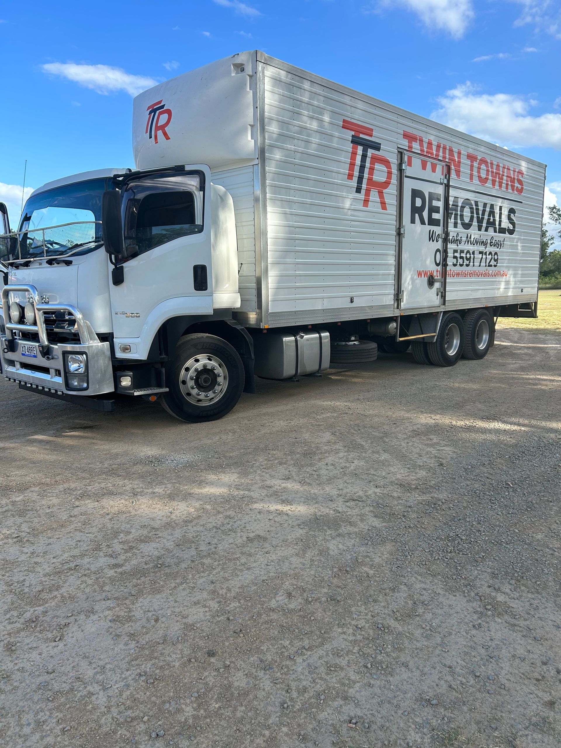 White Removal Truck Parked On Gravel — Twin Towns Removals Mid North Coast In Tuncurry, NSW