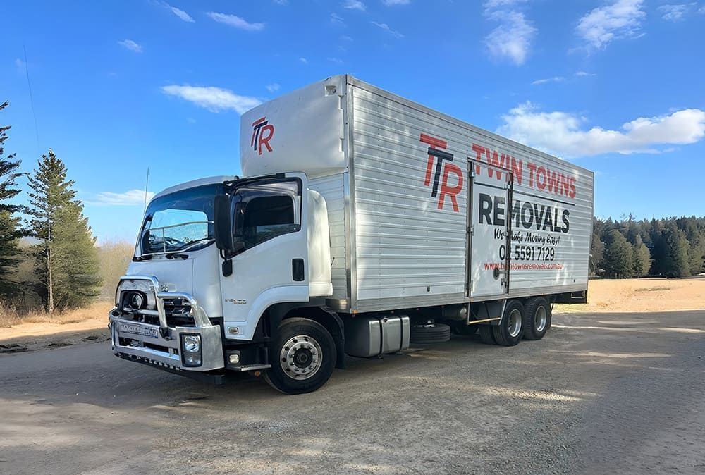 Removal Truck Parked On Gravel -  Twin Towns Removals Mid North Coast In Forster, NSW
