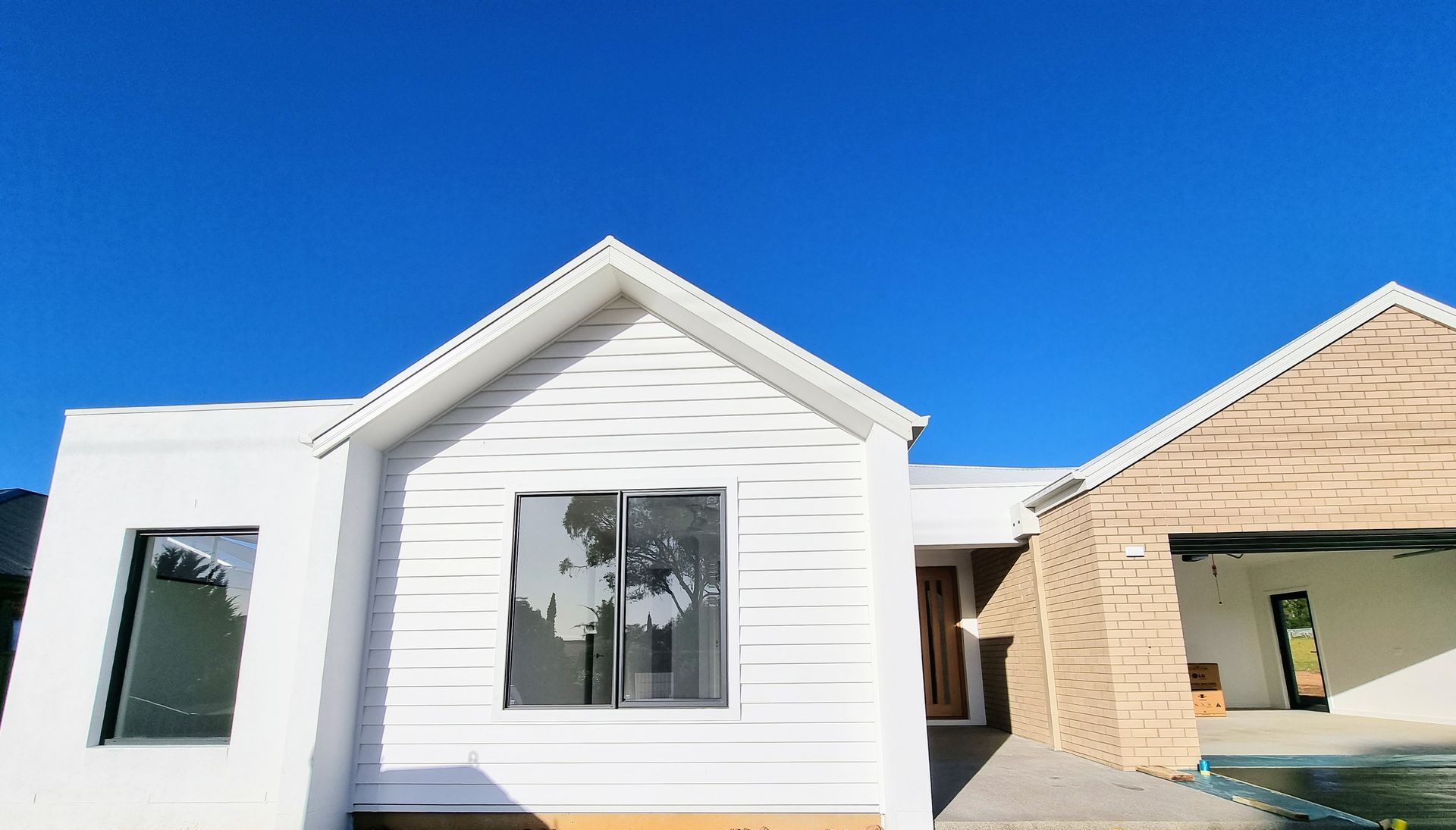 A Room With A Lot Of Windows And A Vacuum Cleaner On The Floor — Crampton Painting & Decorating Pty Ltd In Maiden Gully, VIC