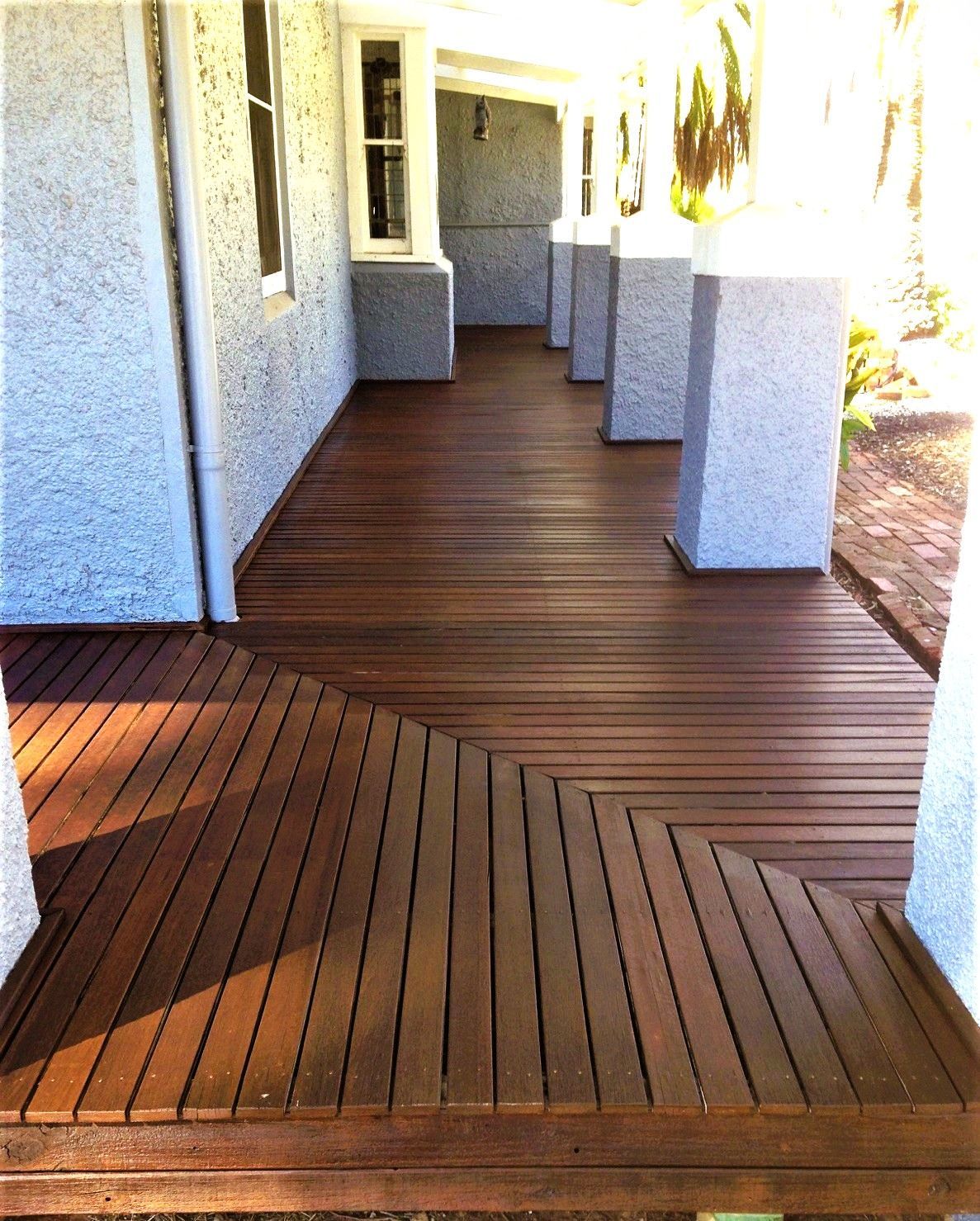 Wooden deck being freshly stained — Crampton Painting & Decorating Pty Ltd In Maiden Gully, VIC