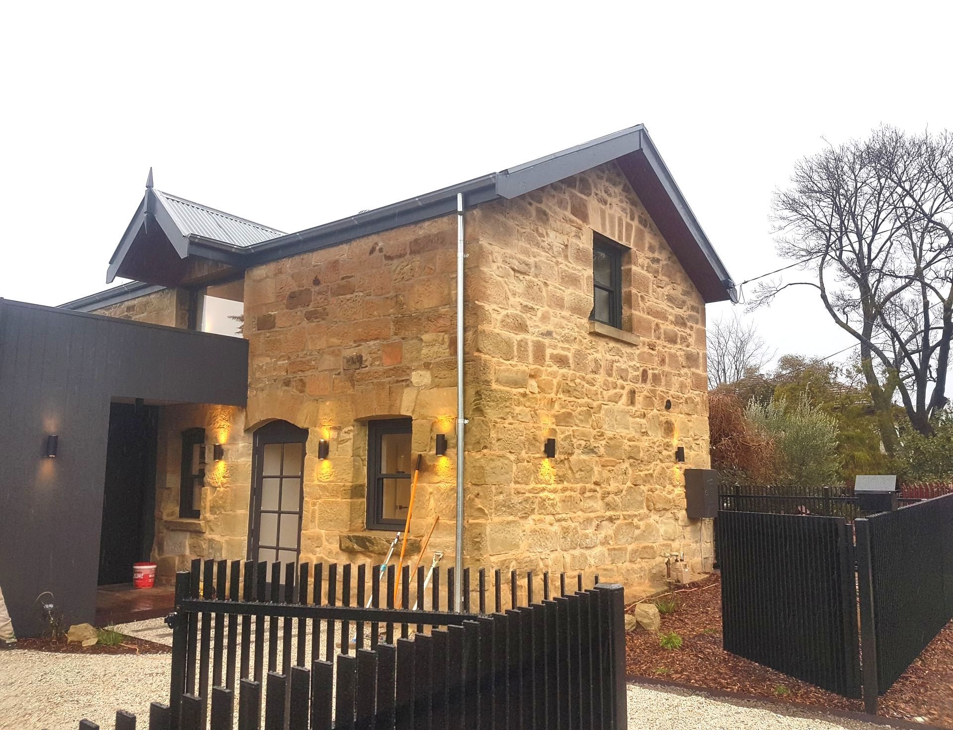 A White House With A Porch And Stairs — Crampton Painting & Decorating Pty Ltd In Maiden Gully, VIC