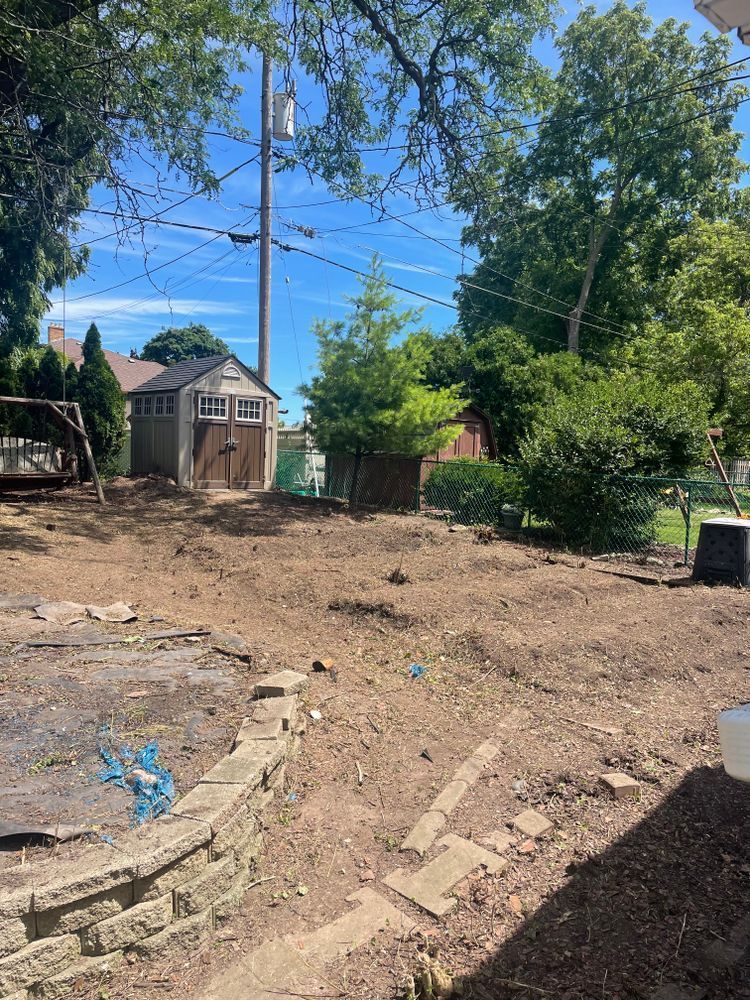 There is a lot of dirt in the backyard of a house