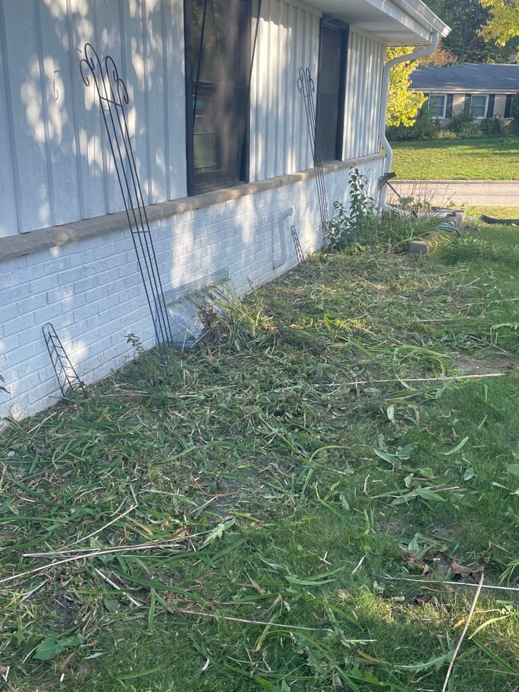 A white house with a lot of grass in front of it