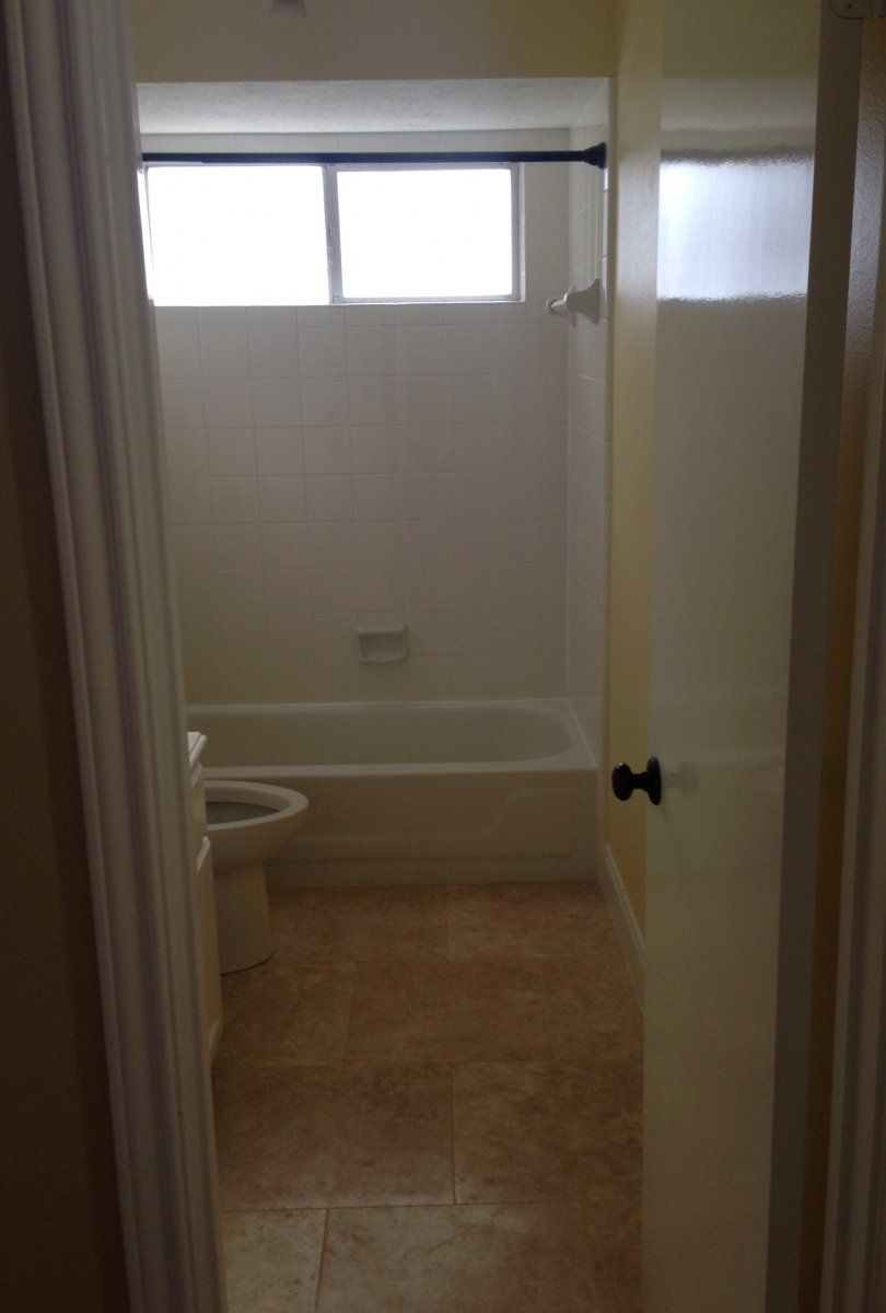 Flooring Installation — New Installed Flooring On Bathroom in Stafford, TX