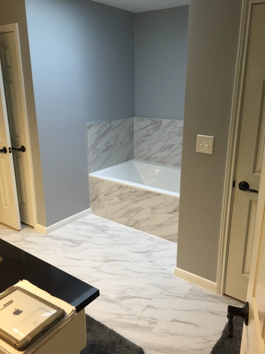 Bath — Bathroom With Marble Tiles in Stafford, TX