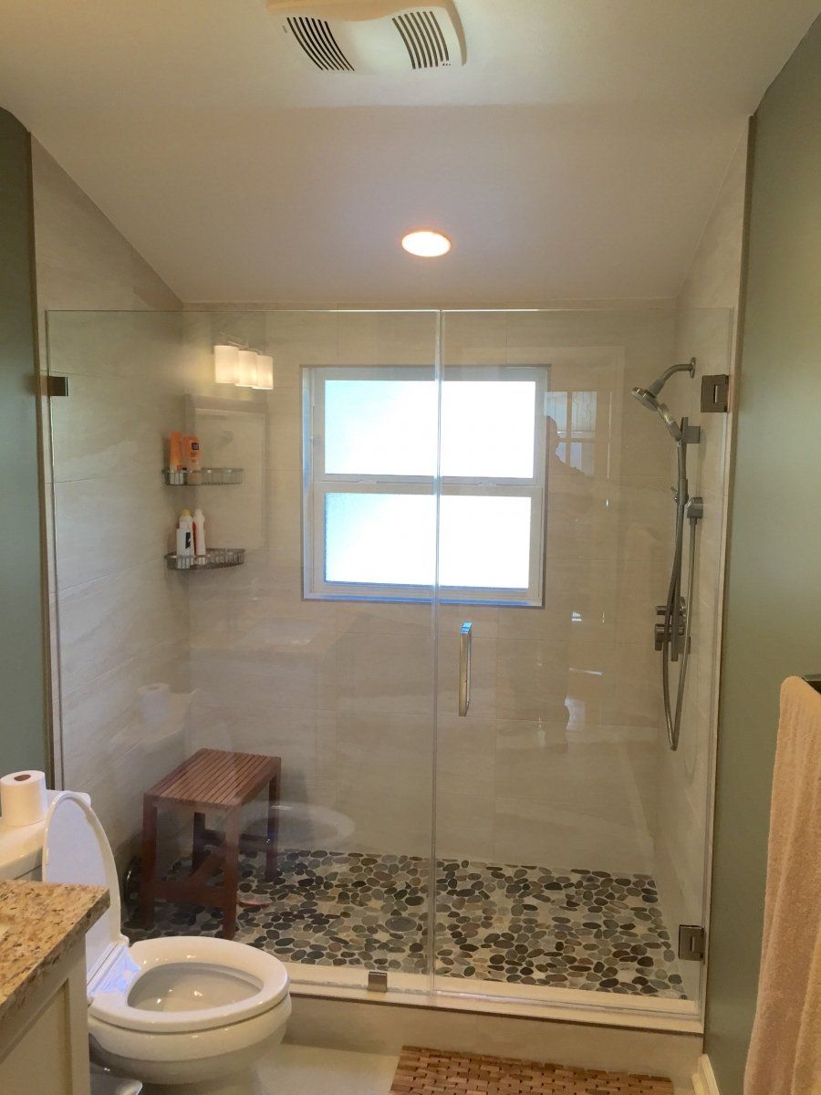 Bathroom Contractors — Chair Inside The Shower Room in Stafford, TX