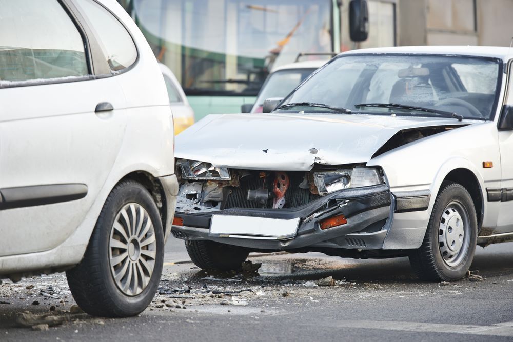 Two Cars Are Involved in a Car Accident on a City Street — Smash Repairs In Nabiac, NSW