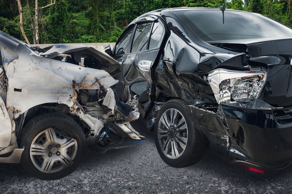 Two Cars Are Damaged in a Car Accident on the Road — Smash Repairs In Forster, NSW