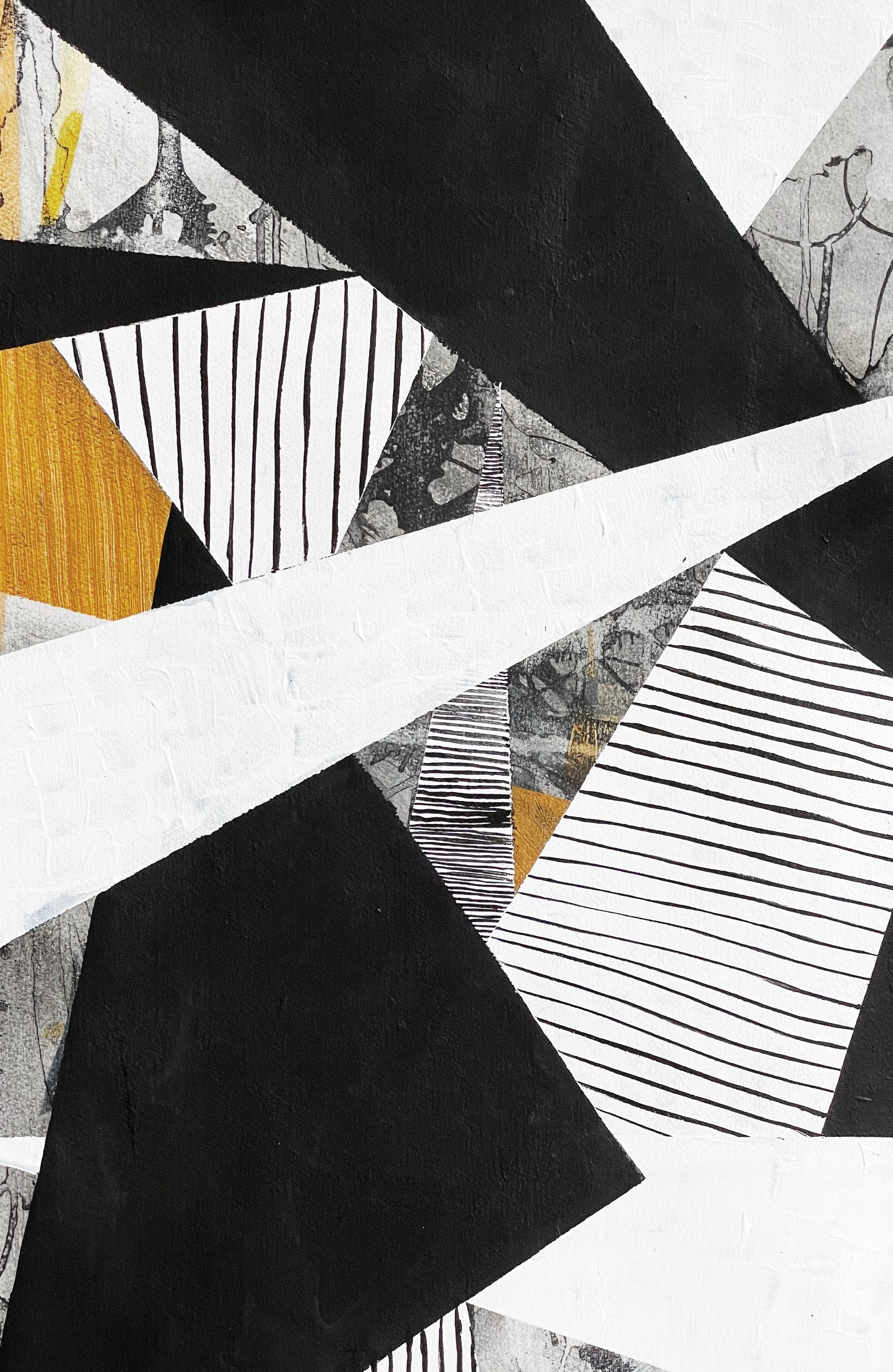 A black , white and gold geometric pattern on a white background