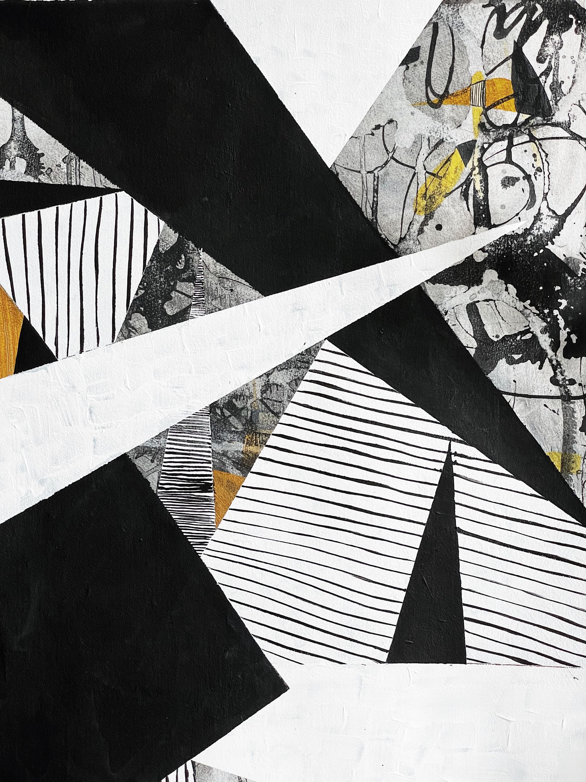 A black and white collage of triangles and lines