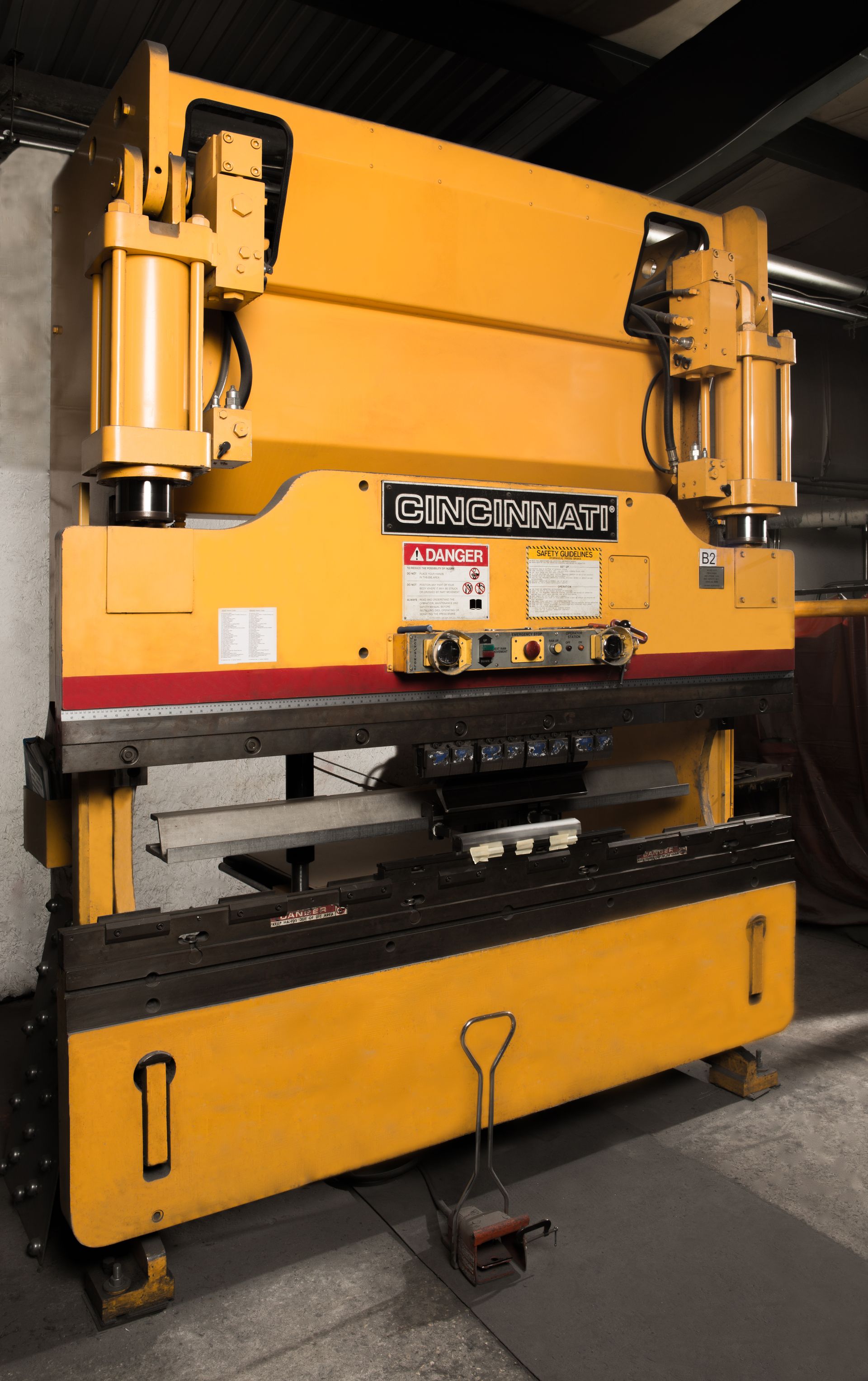 A yellow machine with the word ching on it